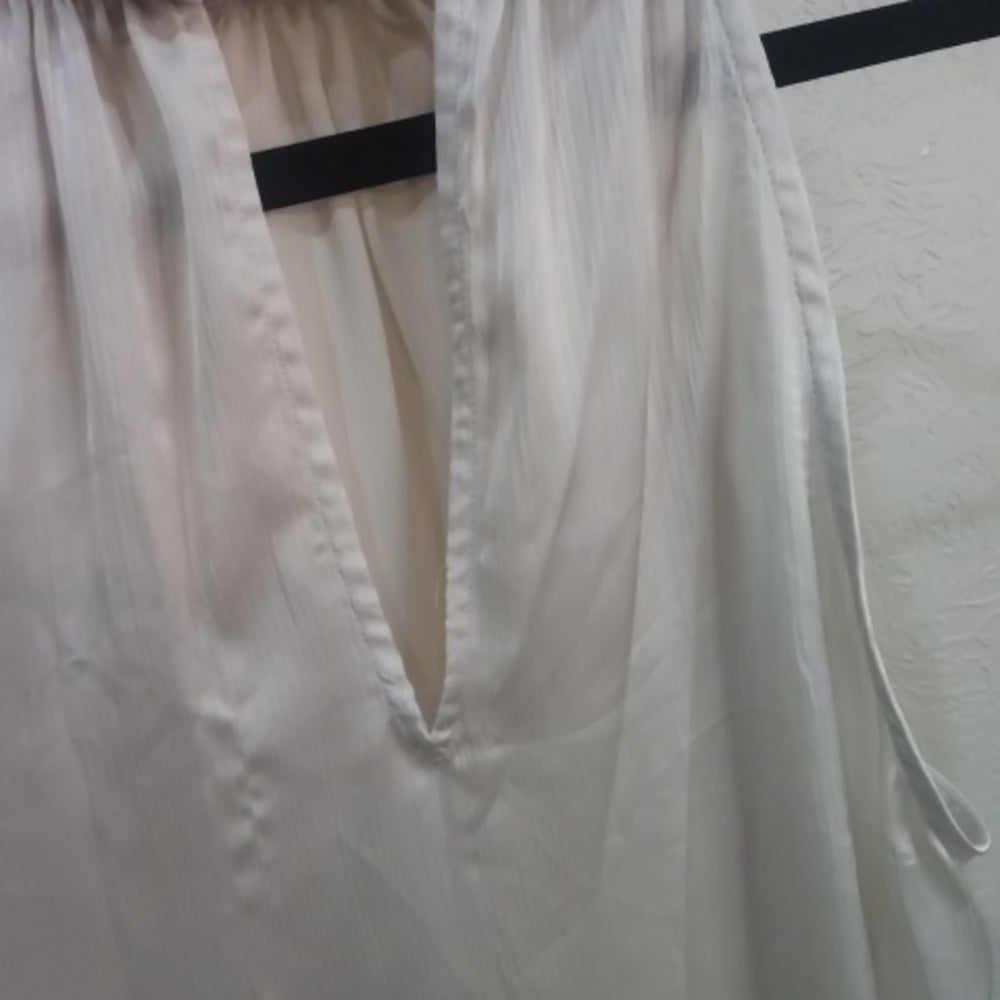 Elegant Cream Sleeveless Blouse