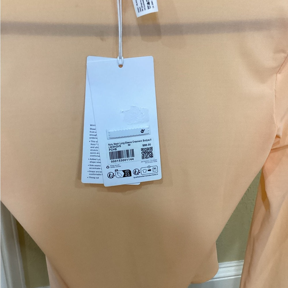 NWT SIZE MEDIUM Lululemon Athletica Orange Asymmetrical Bodysuit
