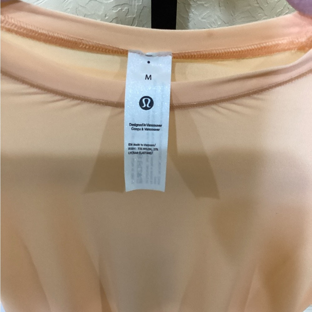 NWT SIZE MEDIUM Lululemon Athletica Orange Asymmetrical Bodysuit