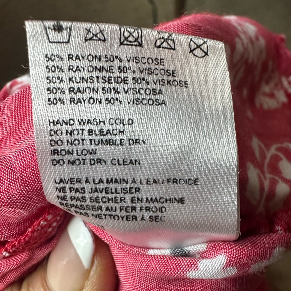 Red Asymmetrical Sleeveless Blouse with Ruffled Tie Front