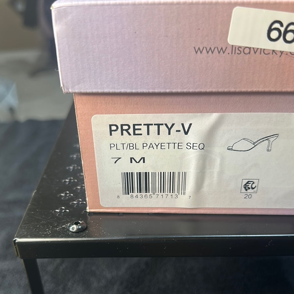 66. NEW SIZE 7 M Chic Black Heels with Sleek Design