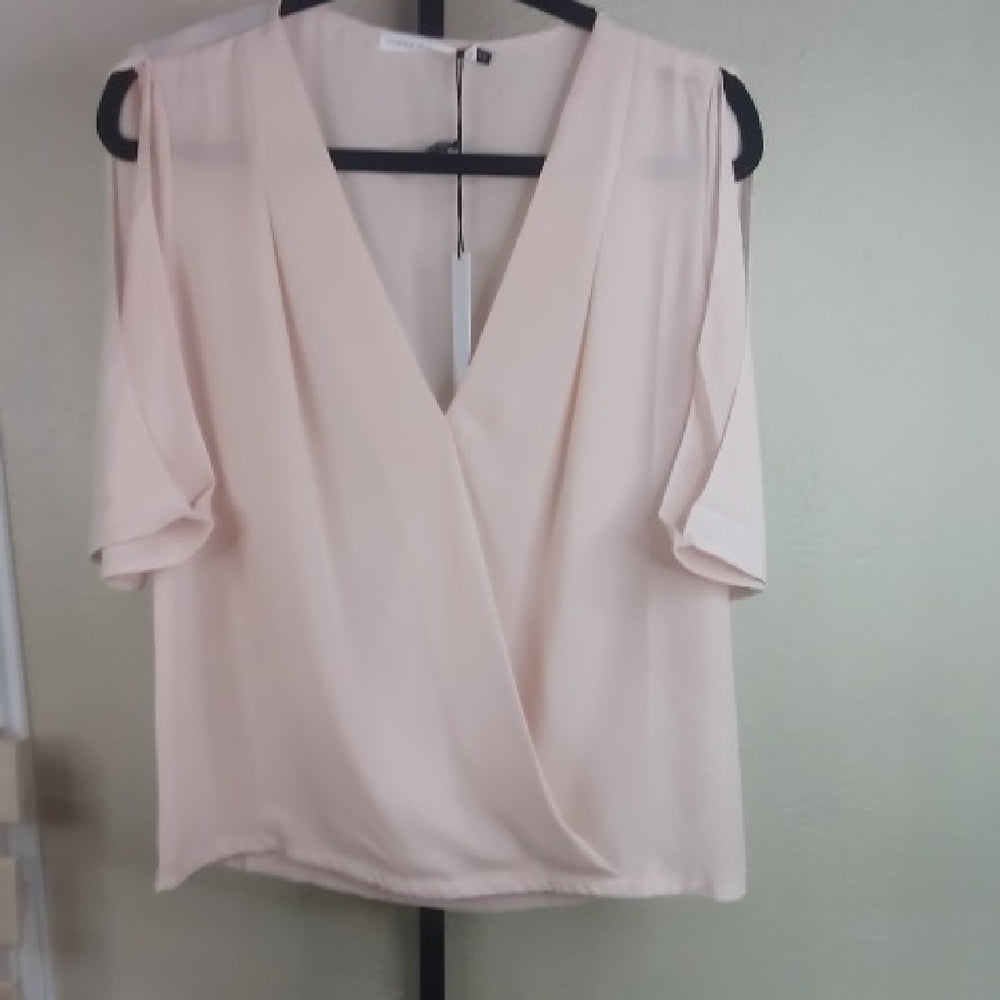 Chic Cream Blouse with Elegant Design