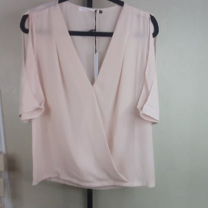 Chic Cream Blouse with Elegant Design