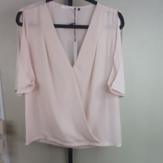 Chic Cream Blouse with Elegant Design