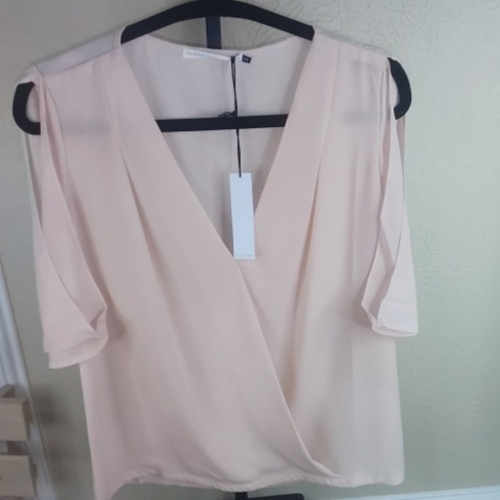 Chic Cream Blouse with Elegant Design