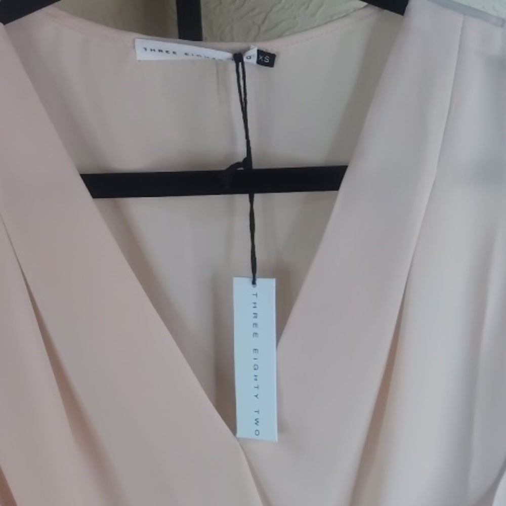 Chic Cream Blouse with Elegant Design