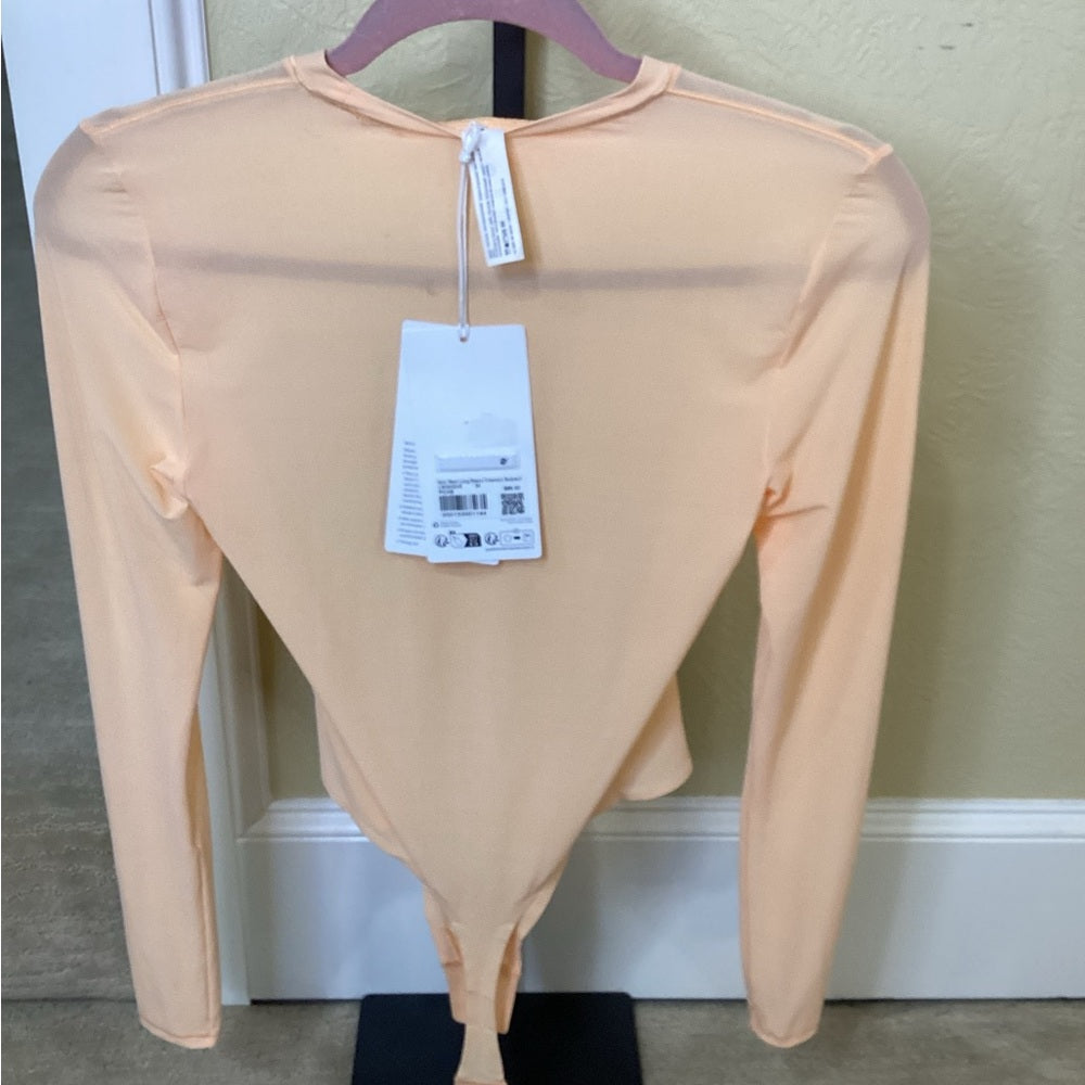 NWT SIZE MEDIUM Lululemon Athletica Orange Asymmetrical Bodysuit