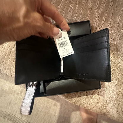 Michael Kors White Wallet with Iconic Monogram Design