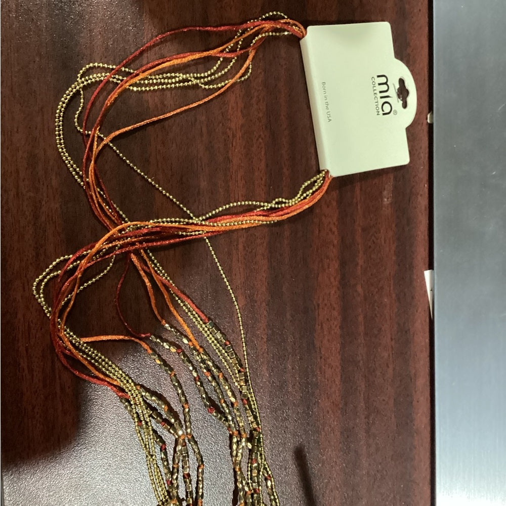 MIA Gold and Orange Layered Necklace with Bohemian Charm