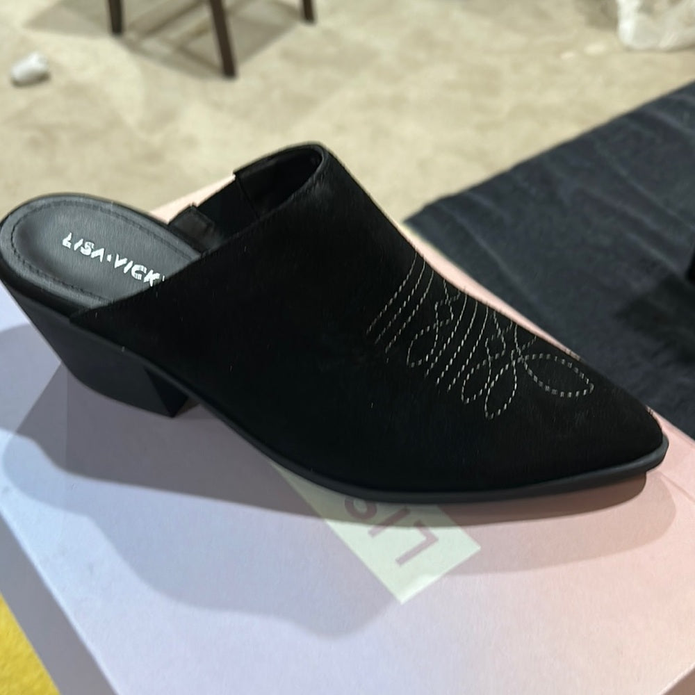 55. NEW SIZE 8M Chic Black Mules with Modern Appeal