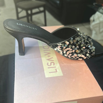 66. NEW SIZE 7 M Chic Black Heels with Sleek Design