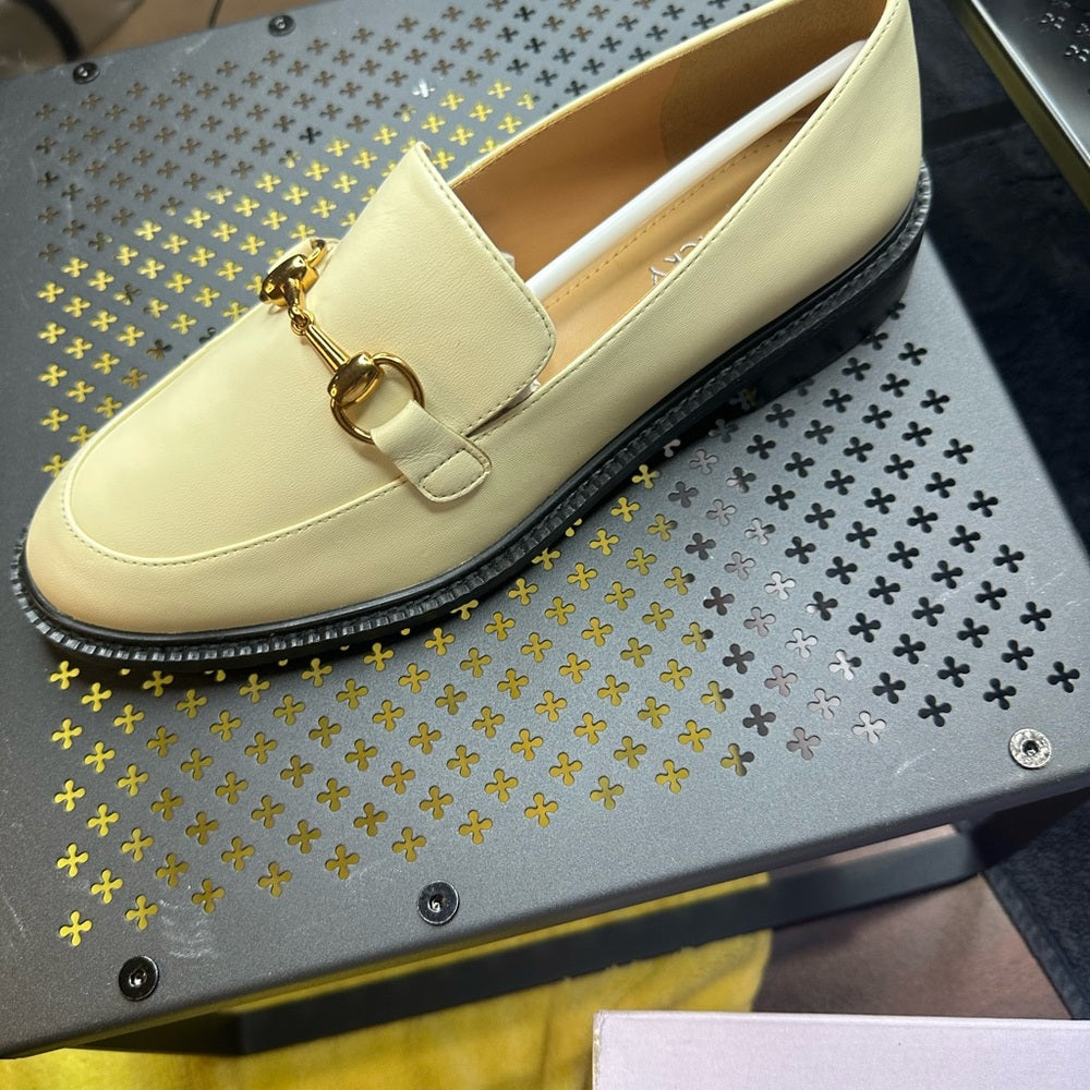 132.128.131. Gucci Cream Loafers with Gold Horsebit