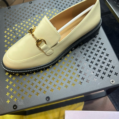 132.128.131. Gucci Cream Loafers with Gold Horsebit