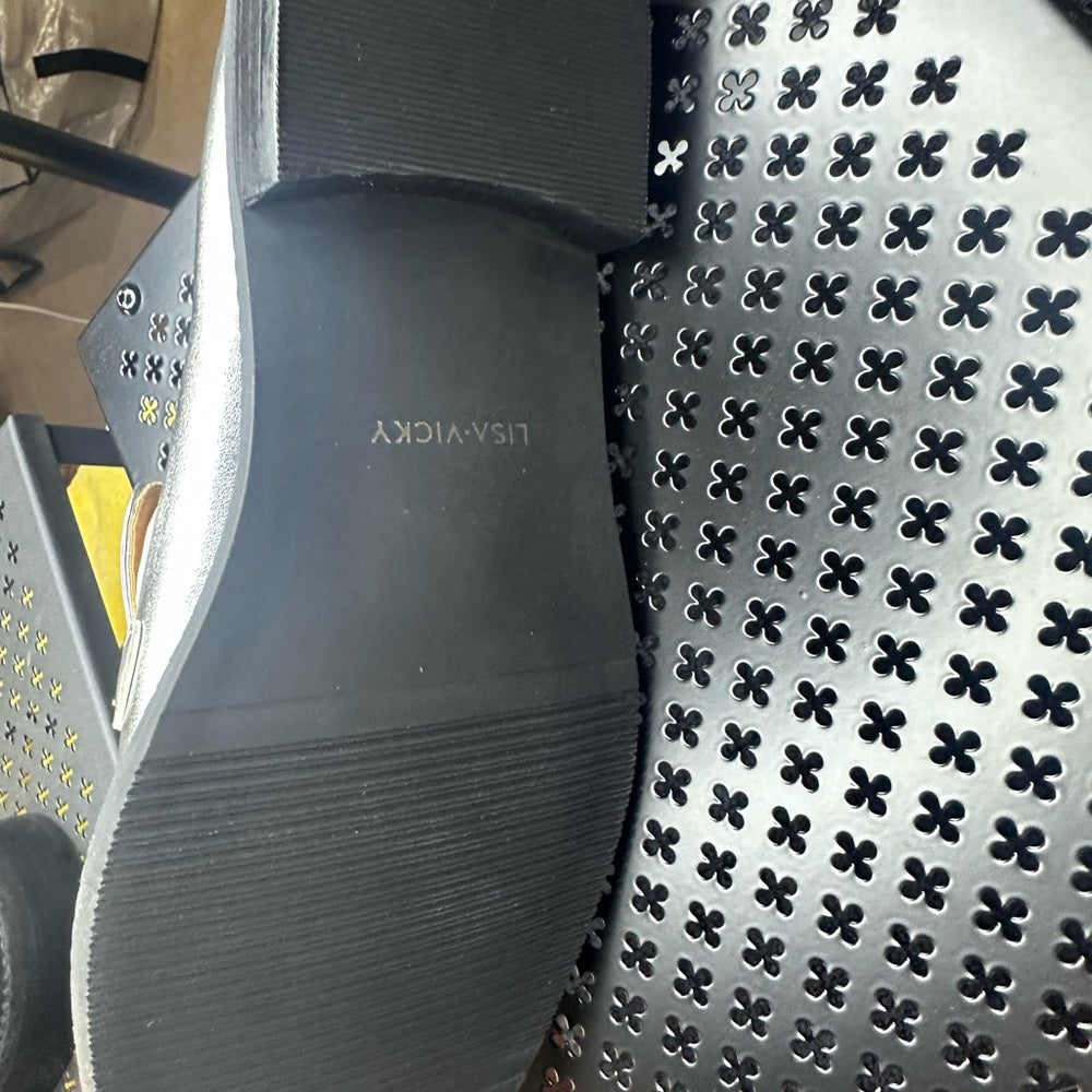 129 133. Silver Metallic Flats with Horsebit Detail