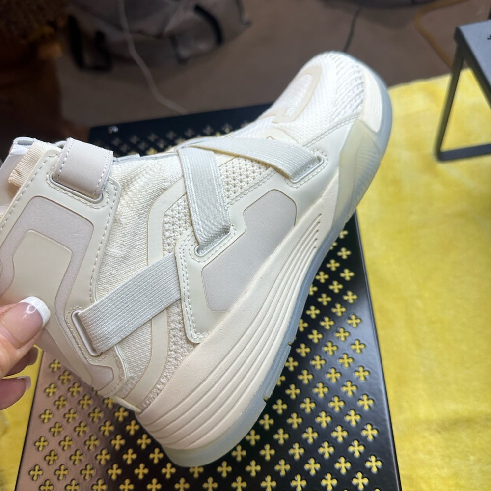 119. APL Cream Sneakers with Modern Strap Design