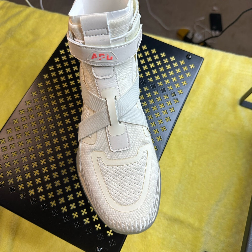 119. APL Cream Sneakers with Modern Strap Design