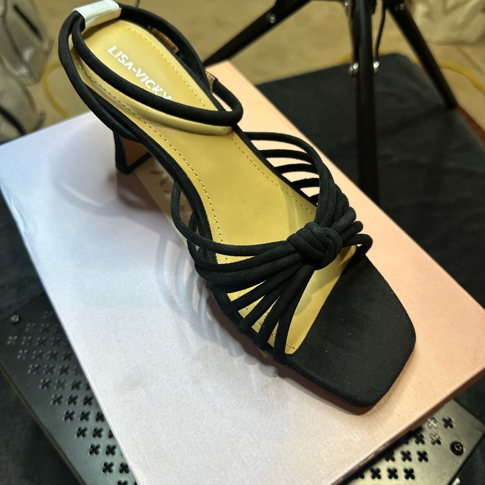 311.328.NEW SIZE 9.5 Black and Tan Sandals with Elegant Design