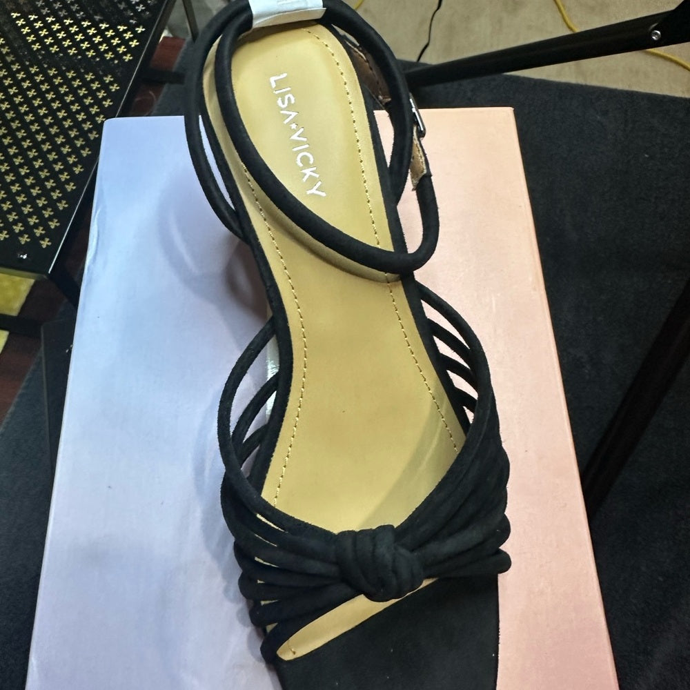 311.328.NEW SIZE 9.5 Black and Tan Sandals with Elegant Design