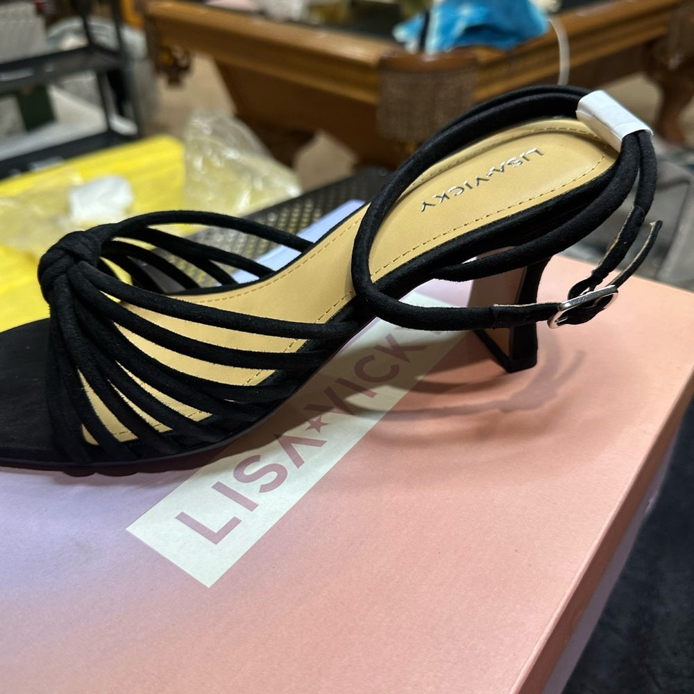 311.328.NEW SIZE 9.5 Black and Tan Sandals with Elegant Design