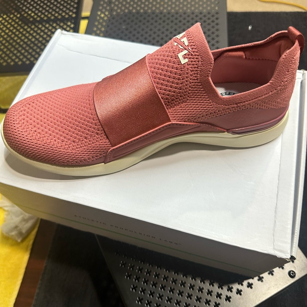 340. NEW M/9.5 W/11 APL Pink and White Knit Slip-On Sneakers
