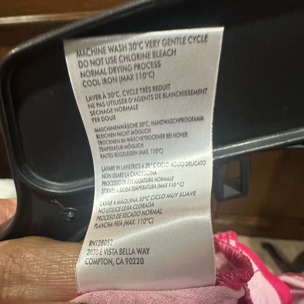 NWT SIZE S Elegant Floral Blouse with Twist Front