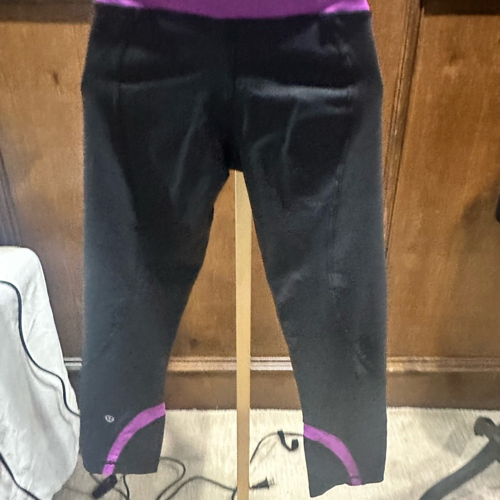 SIZE 6 Lululemon Athletica Black and Pink Leggings