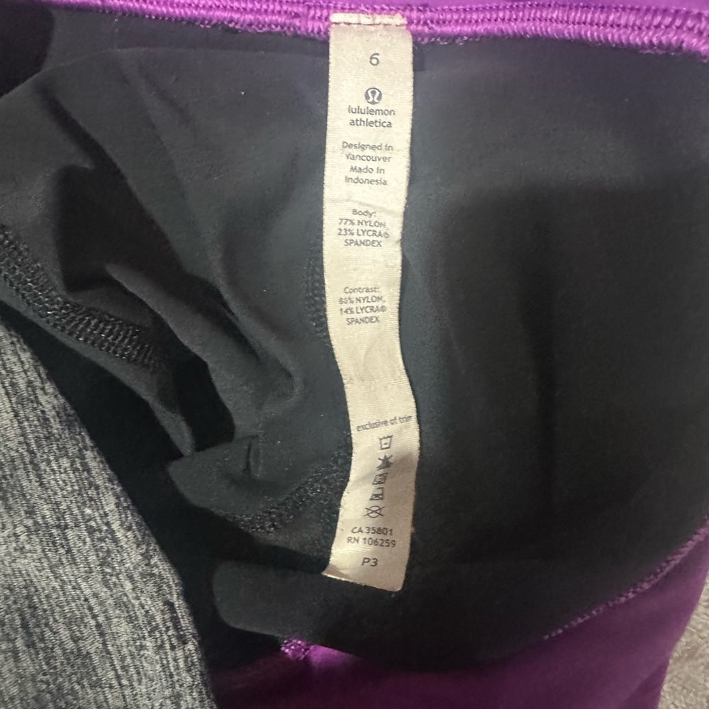 SIZE 6 Lululemon Athletica Black and Pink Leggings