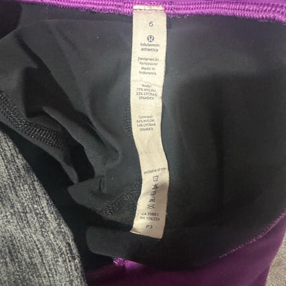 SIZE 6 Lululemon Athletica Black and Pink Leggings