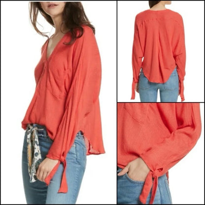 NWOT SIZE XS OVERSIZED WILL FIT UP TO A L Free People Vibrant Red Wrap Blouse