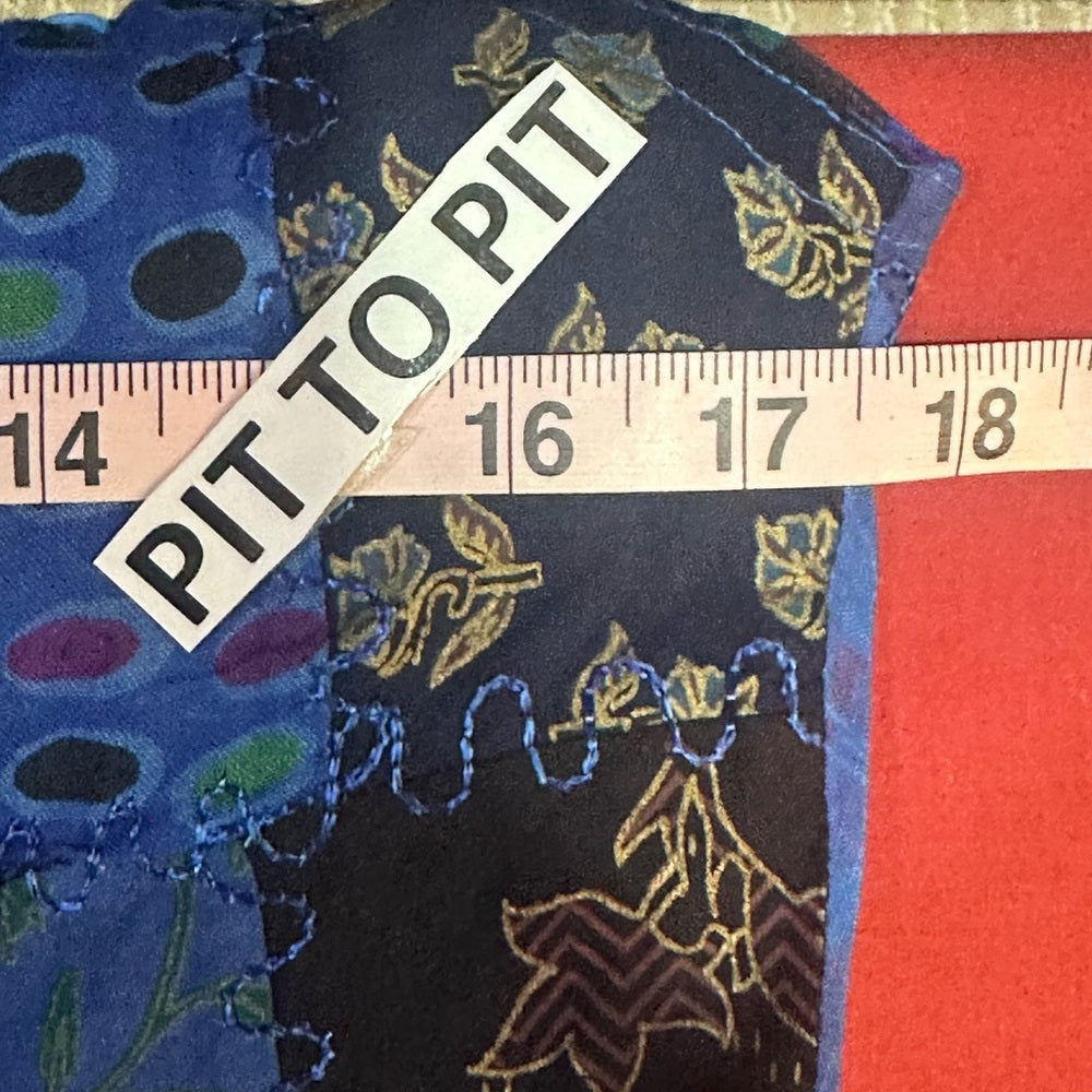 NWT SIZE S/M will fit up to a L Advance Apparels Blue Patchwork Jumpsuit